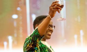 State Department for Correctional Services Principal Secretary Dr. Salome M. Beacco raises a glass for a toast