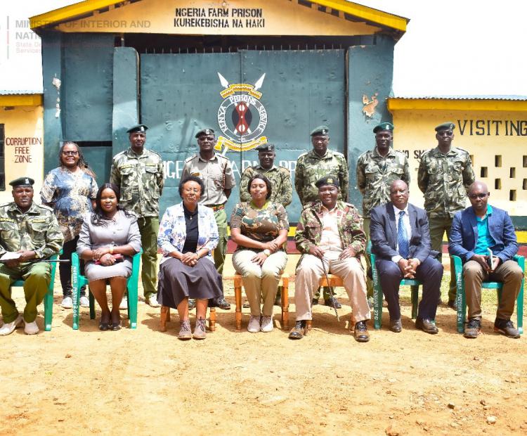 PS Correctional Mary Muthoni (middle) poses for a group photo during a visit of Ngeria Farm Prison. Photo: Collins William