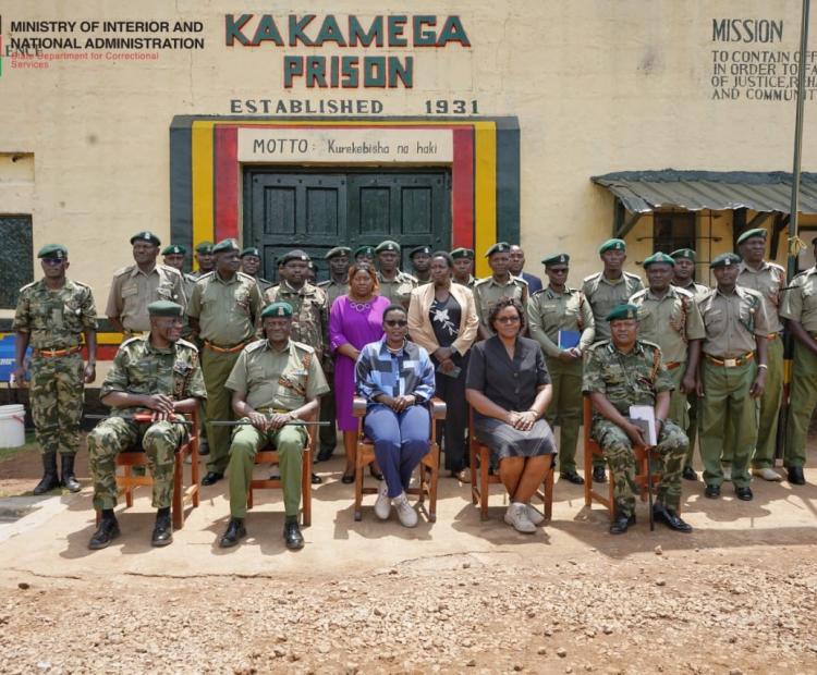 Correctional Services PS Ms. Salome M. Beacco (seated in the middle) takes a group photo during her visit to Kakamega Prison. Photo, Patrick Ambani.