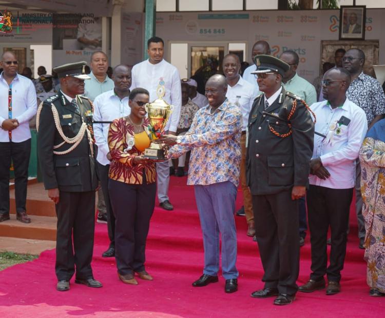 HE the Deputy President Rigathi Gachagua presents a trophy to Correctional Services Principal Secretary Ms. Salome M. Beacco during the ASK Mombasa International Show.  Accompanying her was the Commissioner General of Prisons Brg (Rtd) John Warioba (on her right) and the Coast Regional Prisons Commander Nicholas Mwandau, Deputy Commissioner of Prisons (on the DP’s Left). Photo: Patrick Ambani.
